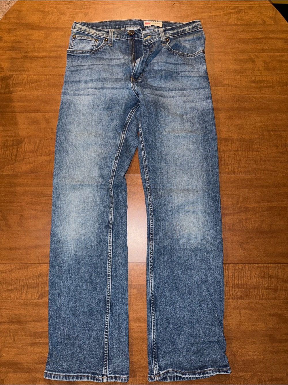 Wrangler Men's Relaxed Boot Jeans in Distressed Blue Wash